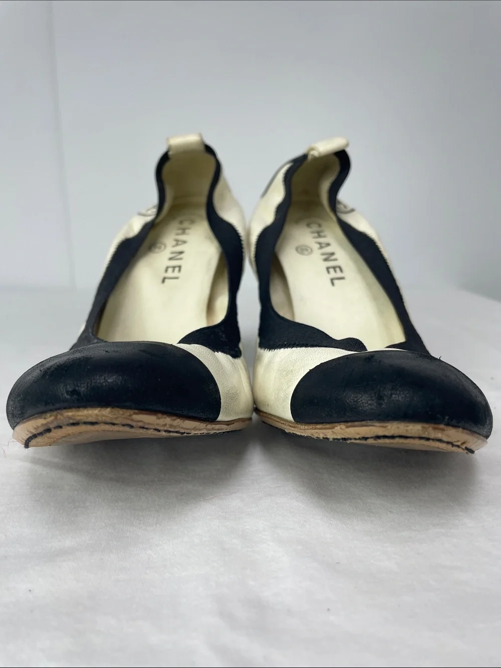 CHANEL Black & White Cap-Toe Leather Pumps